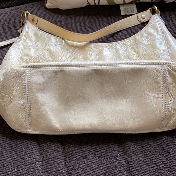 Cream/ivory colored authentic coach purse. - Picture 11 of 17